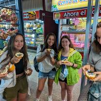 Students try Costa Rican fruits at the central market