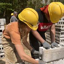 Working alongside community members