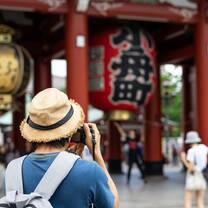 Student taking photo of Japanese temple