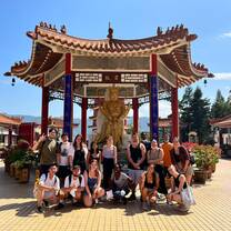A group of Chatteris tutors exploring a Buddhist Monastery