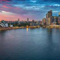 The sun setting over Sydney harbour