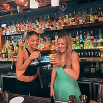 Two girls making cocktails in a Sydney Bar