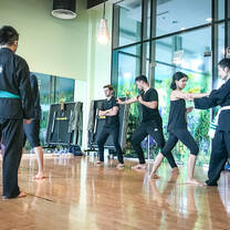 interns taking a traditional martial arts class