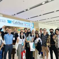 interns at a cafe trade show