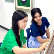 Collaboration During Painting Class