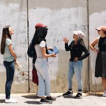 Yahel Volunteers stand by the border wall in East Jerusalem and learn about the geopolitics of east Jerusalem