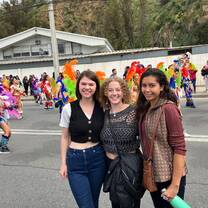 Intern in Chile experiencing a colorful Chilean festival parade during their internship program