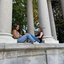 American student leading educational activities with kids in Seville