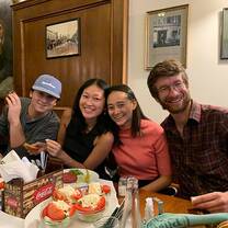 Four CET Prague study abroad students at a restaurant in Prague