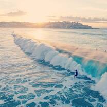 Aerial side view of wave in Australian ocean