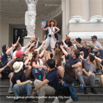 Taking group photos together during City tour!