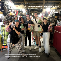 Practicing bargaining skills in Vietnam local markets during Ho Chi Minh city tour