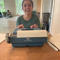 Baby blue typewriters from 1975! You don't have to write on one but we recommend it.