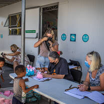 Impact Photography volunteer during a community outreach activity of NGO