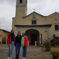 Students in front of a church in a village in the North of Italy 
