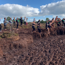 Students taking part in the bog jump