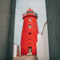 A red lighthouse outside of Dublin