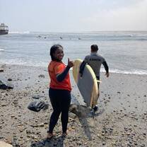 Posing for a photo before going into the ocean for a surfing lesson in Huanchaco, 20 minutes outside of Trujillo.  