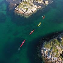 Kayakers padling thrugh archipelago, drone picture