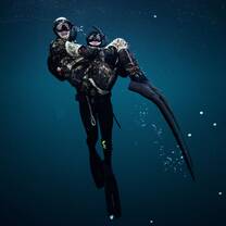 Freedivers "carying" each other
