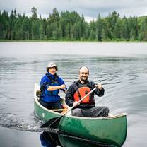 Two men canoeing in the Outaouais, Québec, Canada.