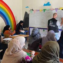 Teacher teaching students ESL