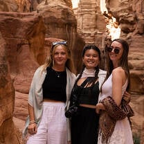 Three student posing for a picture in Jordan