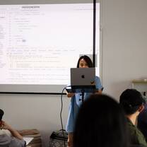 Teachers and students presenting