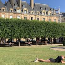 Journal writing in the Tuileries Gardens in Paris