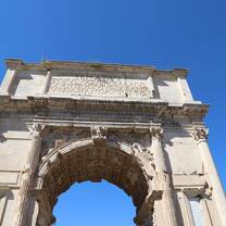 Walking under the Arch of Titus into the ancient Roman Forum