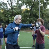 Morning martial arts are led by educated instructors