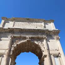 Walking under the Arch of Titus into the ancient Roman Forum