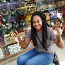 Study abroad student with Henna art in India