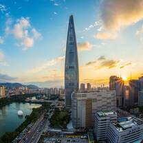 A view of Seoul, South Korea, with a tower rising in the middle of the frame