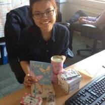 CEA CAPA student in London holding thank you card and gifts