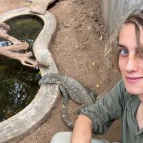 Intern with a Nile Monitor Lizard