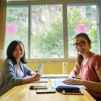 student and teacher learning chinese