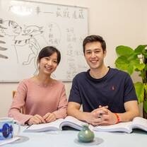 student and teacher in chinese class