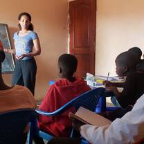 Teaching English to street boys.