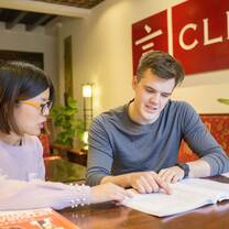 student and teacher learning chinese