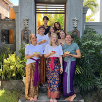 Participants posing with their Balinese offerings Canang Sari 