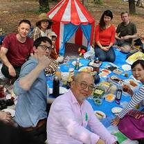 A picnic lunch in the park with your co-workers is common in Japan