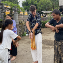 Intern learning traditional Balinese dance 