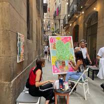 Adelante Abroad intern painting in a Barcelona art studio with local artist guidance