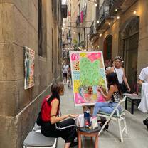 Adelante Abroad intern painting in a Barcelona art studio with local artist guidance