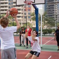 Students play sports in each country they visit