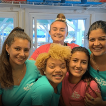 Four young women working at confection shop in Mystic, Connecticut