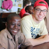 photo of volunteer and young male student
