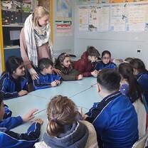 Volunteer at work with children