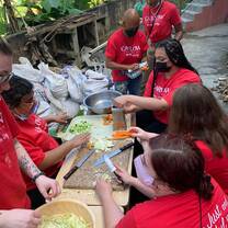 volunteers preparing food at the soup kitchen